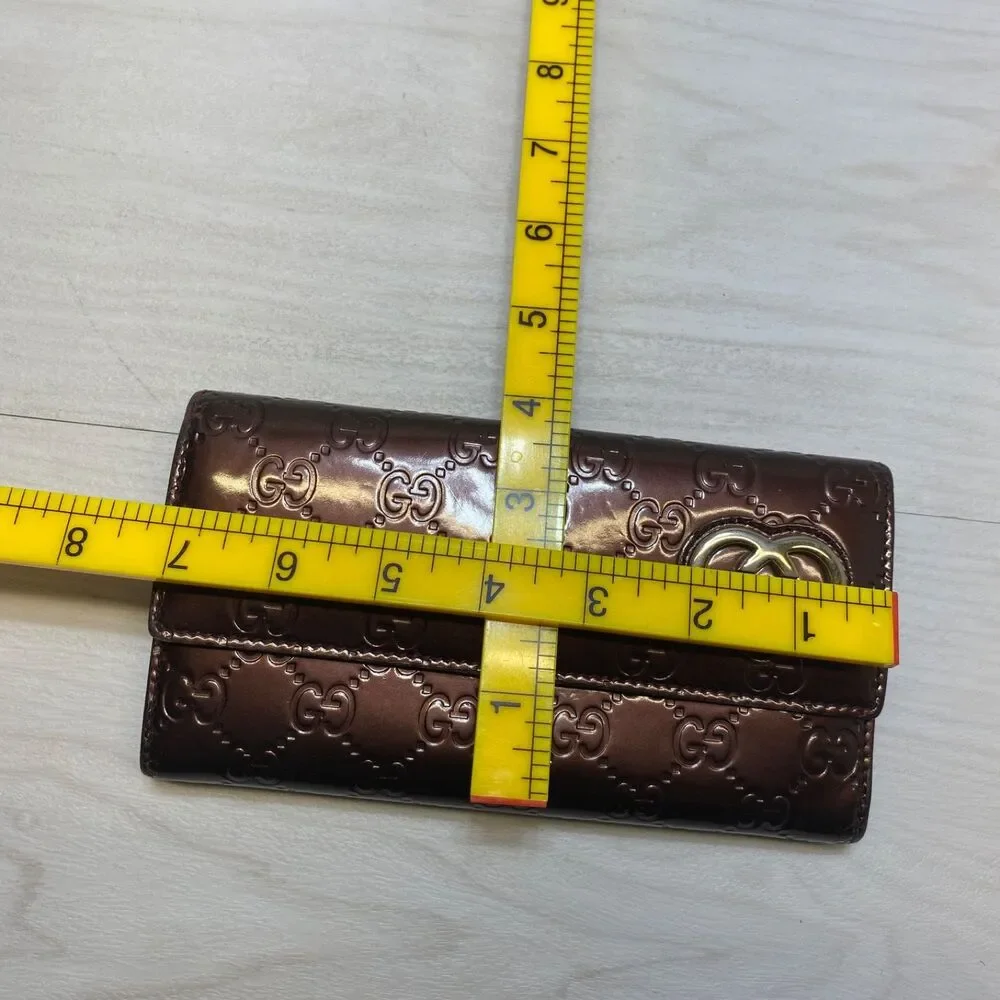 Gucci Shiny Guccissima Lovely Heart Continental Wallet in metallic burgundy - Picture 13 of 13